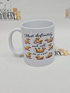 MOST DEFINITELY NOT ALL IN A ROW MUG